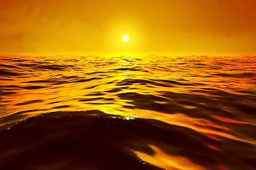 Image showing a golden sunset over the ocean