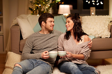 Image showing happy couple drinking cacao at home