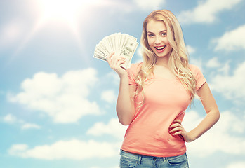Image showing happy young woman with usa dollar cash money