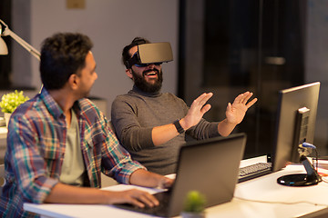 Image showing creative man in virtual reality headset at office