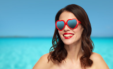 Image showing woman with red lipstick and heart shaped shades