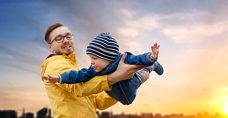 Image showing father with son playing and having fun outdoors