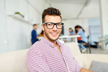 Image showing happy creative male worker at office or student