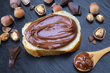 Image showing Hazelnut Nougat cream on slice of bread