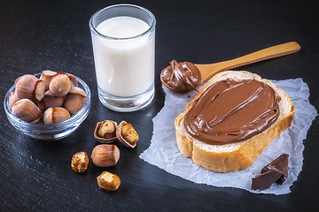 Image showing Hazelnut Nougat cream on slice of bread