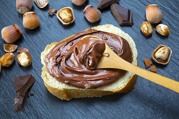 Image showing Hazelnut Nougat cream on slice of bread