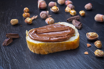 Image showing Hazelnut Nougat cream on slice of bread