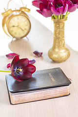 Image showing Holy Bible with flowers on wooden table