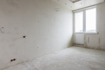 Image showing Room in new building, plastered walls, concrete floor, two-level ceiling