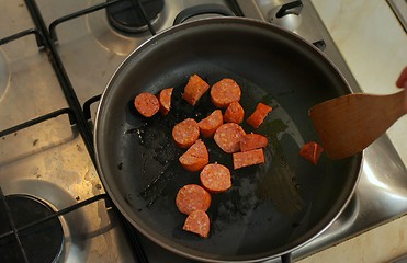 Image showing Cooking with sausages