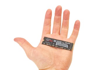 Image showing Circuit Board of an SSD held in hand