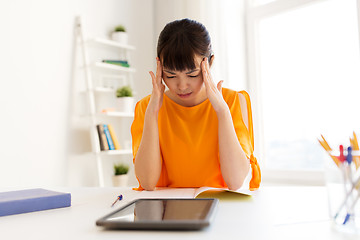 Image showing asian student girl with tablet pc learning at home