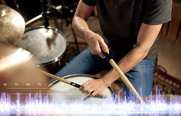 Image showing musician playing drums at sound recording studio