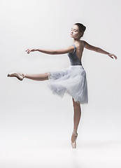 Image showing Young classical dancer isolated on white background.