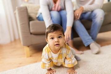 Image showing little baby girl on floor at home