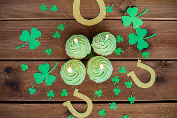 Image showing green cupcakes, horseshoes and shamrock