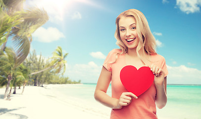 Image showing happy woman or teen girl with red heart shape