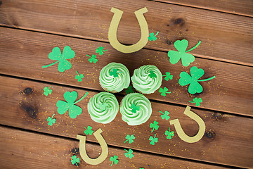 Image showing green cupcakes, horseshoes and shamrock