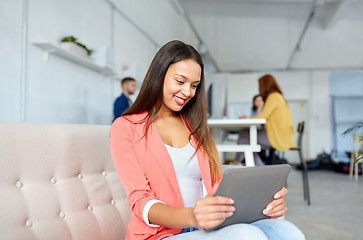 Image showing african american woman with tablet pc at office