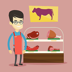 Image showing Butcher offering fresh meat in butchershop.