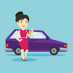 Image showing Woman holding keys to her new car.