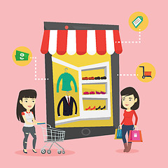 Image showing Two women doing shopping online.