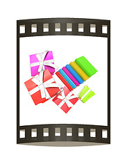 Image showing Gifts and books. 3d illustration. The film strip.