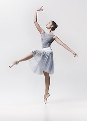 Image showing Young classical dancer isolated on white background.