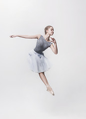 Image showing Young classical dancer isolated on white background.