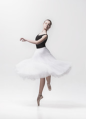 Image showing Young classical dancer isolated on white background.