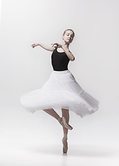 Image showing Young classical dancer isolated on white background.