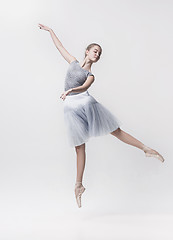 Image showing Young classical dancer isolated on white background.