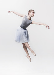 Image showing Young classical dancer isolated on white background.