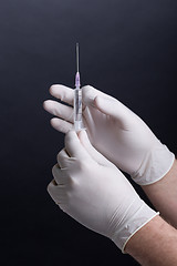 Image showing Hands with syringe