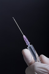 Image showing Hand with syringe