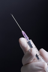 Image showing Hand with syringe