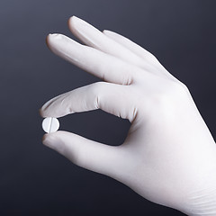 Image showing Hand with pill