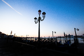 Image showing Street lamp silhouette in Venice, Italy at sunrise