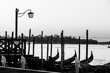 Image showing Street lamp and gondolas in Venice, Italy