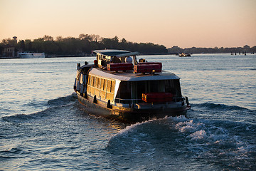 Image showing Transportation boat at sunrise in Venice, Italy