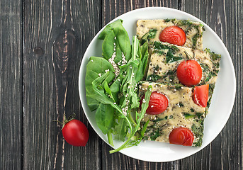 Image showing Frittata with spinach and tomatoes