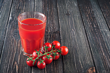 Image showing Tomato juice and cherry tomatoes