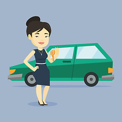 Image showing Woman holding keys to her new car.