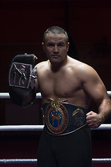 Image showing kick boxer with his championship belt