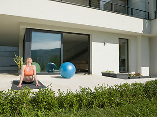 Image showing woman doing morning yoga exercises