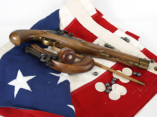Image showing Flag and Guns