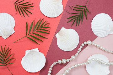 Image showing Tropical flat lay with seashells and pearls