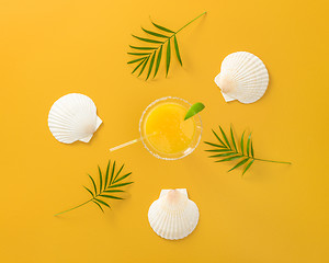 Image showing Tropical cocktail on bright summer background