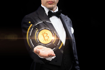 Image showing close up of magician with bitcoin symbol