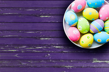 Image showing close up of colored easter eggs on plate